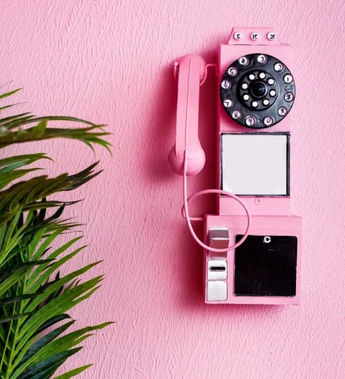 Pink,Old,Traditional,Phone,With,Receiver,On,Pastel,Pink,Background